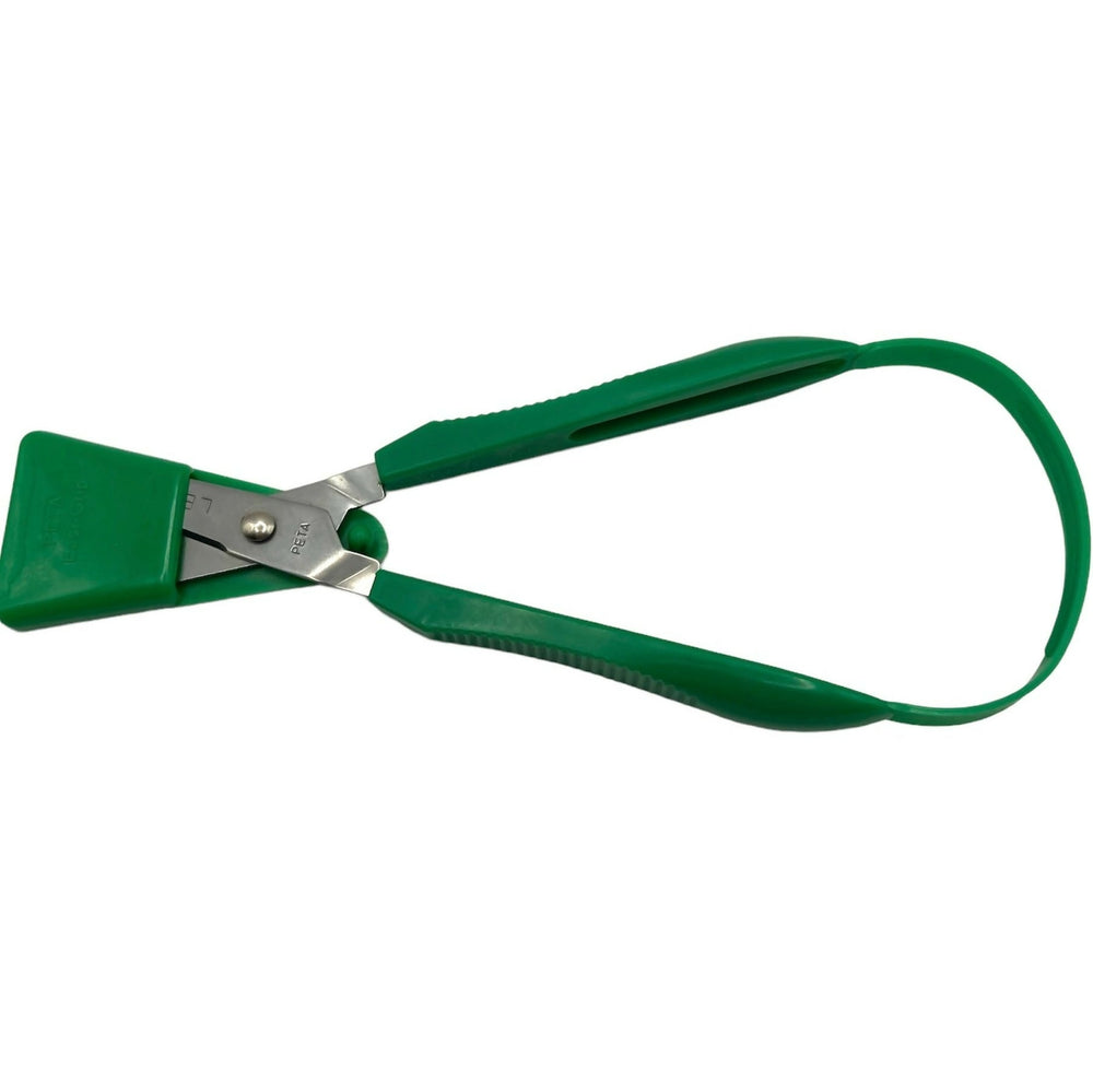 Green left-handed Easi-Grip Scissors with blade guard on.